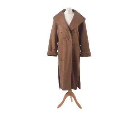 A wool coat by Guy Laroche, the full length camel wool coat with oversized collar, size 40. Condition report: Overall conditi