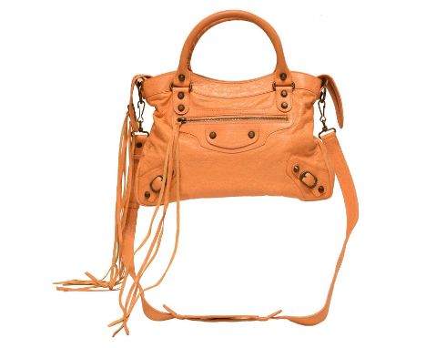 A Balenciaga 'Town' bag, the peach distressed calf leather exterior with aged brass hardware, shoulder strap, and mirror, ser