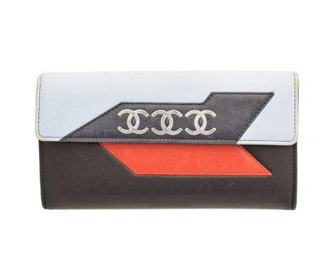 A Chanel Triple Logo Flap Wallet, circa 2016-7, the smooth light blue, navy blue and red calf leather exterior with triple si