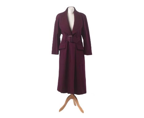 A wool coat by Mugler, the maroon full length coat with press stud fastenings and waist belt.Condition report: Overall condit