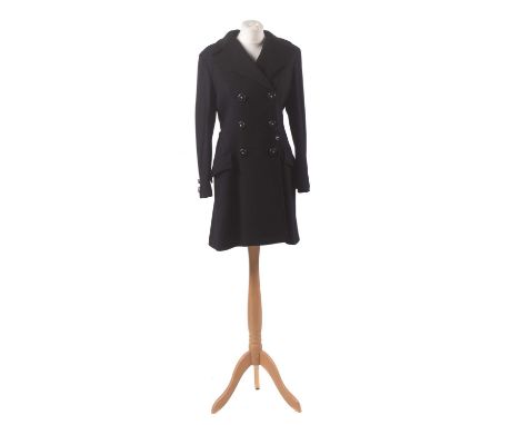 A black wool coat by Gianni Versace Couture, the mid length black wool coat with silver tone buttons bearing makers logo, siz