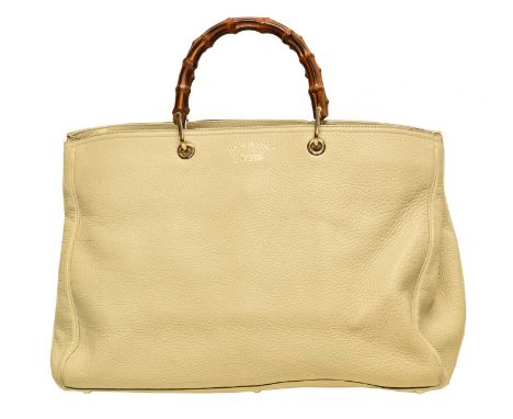 A Gucci Bamboo Shopper Handbag, the ivory grained calf leather exterior with bamboo handles and gold tone hardware, serial no