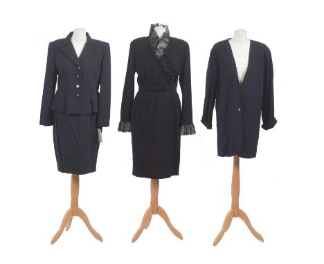 A selection of clothing by Guy Laroche, to include a Guy Laroche boutique black mid-length dress with organza frill detailing