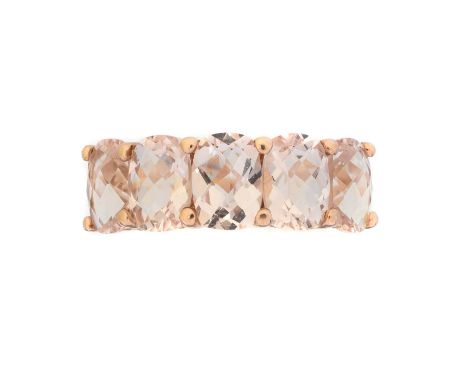 A 9ct gold morganite five stone ring, A 9ct gold morganite five stone ring, the oval shape morganite line within shared claw 