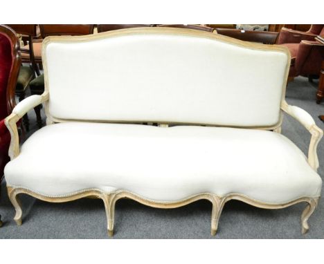 A 19th century French limewood three seater sofa&nbsp;