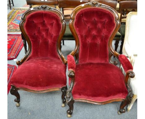 Two Victorian walnut bedroom chairs with button back red velvet upholstery