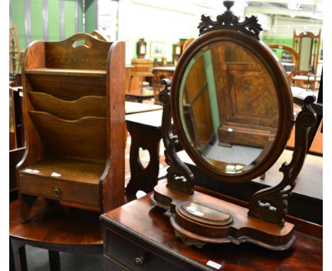 A Victorian mahogany table mirror, a Victorian mahogany writing slope, glazed corner cupboard, oak magazine rack and a travel