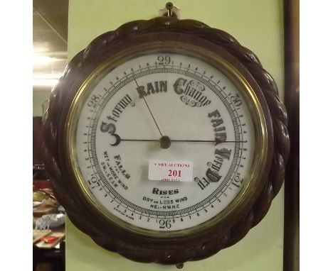 Victorian oak wheel barometer. 
