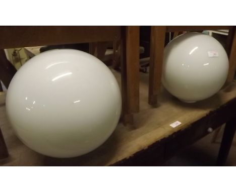 Pair of 1950's industrial milk glass hanging lamp shades. 