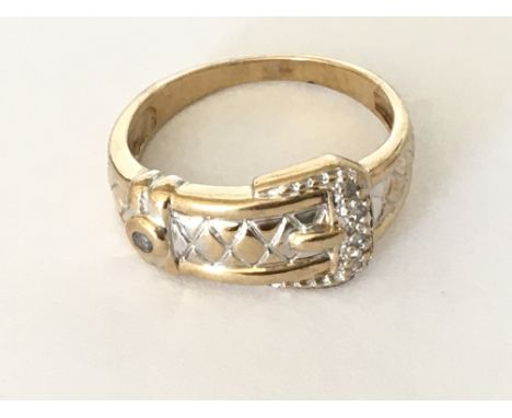 A diamond set buckle ring in 9ct gold