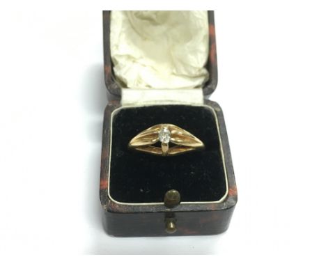 An 18ct gold solitaire diamond gypsy ring, approx 6.3g and approx size R.