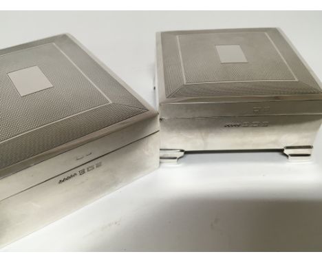 Two quality silver cigarette boxes with engine turned decoration both in excellent condition with no personal engraving and c