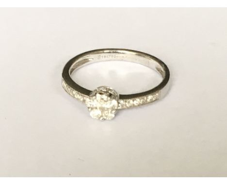 An 18ct white gold all diamond set ring