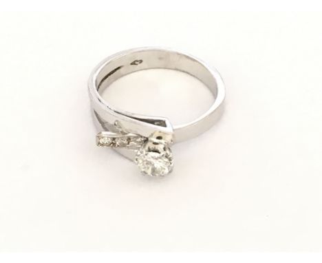 A handmade 18ct white gold diamond set ring