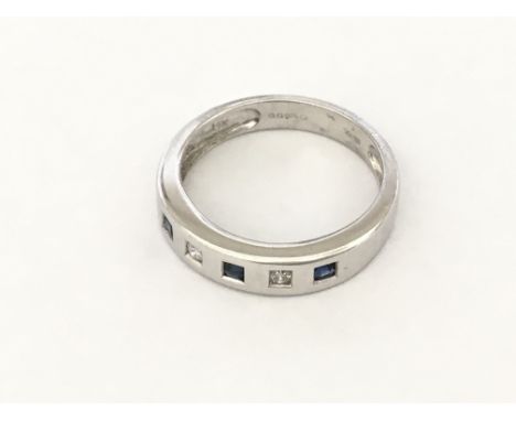 A 14ct white gold sapphire &amp; diamond ring