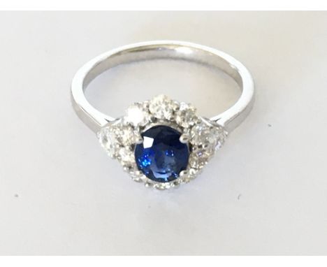 18ct white gold oval sapphire and RBC diamond cluster ring with diamond shoulders, oval cut sapphire 0.83ct, RBC and trapezoi