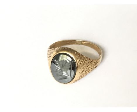 An oval hematite centurion head ring in 9ct gold