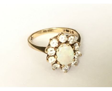 An Opal set cluster ring in 9ct gold