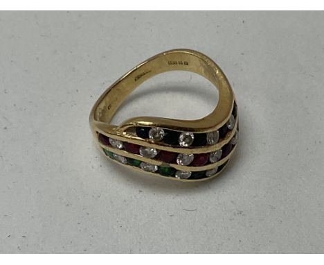An 18ct gold ring set with 3 rows of mixed diamond, Sapphires, Rubies and emeralds.