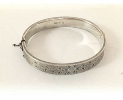 A hallmarked silver bangle.