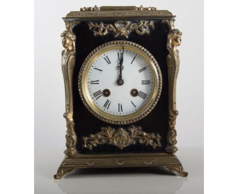 French ebonised and gilt metal mantel clock, cast caryatid figures to the angles, cylinder movement striking on a bell.