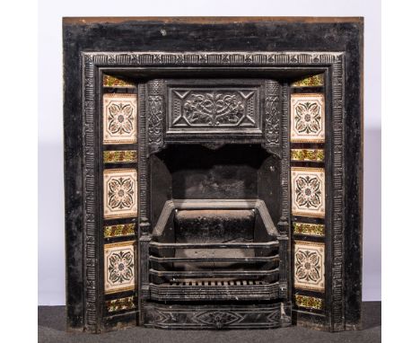 Victorian cast iron fire surround, inset with tiles.