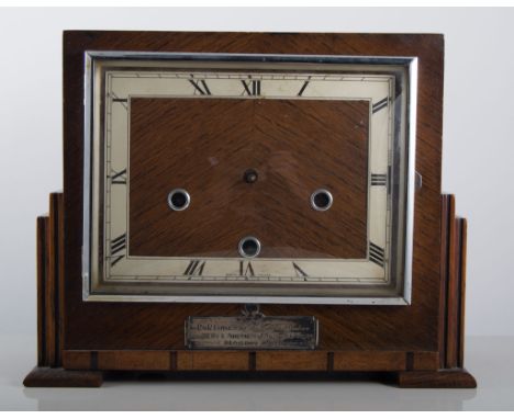 Oak presentation mantel clock, square silvered chapter ring, Enfield movement striking on bells.