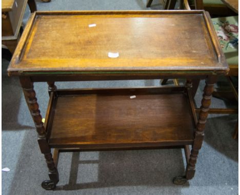 Oak card table, rectangular fold over top with three quarter gallery enclosing a baize lined interior, bobbin turned legs, jo