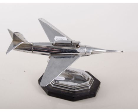 Novelty chrome plated jet plane table lighter, height 14cms.