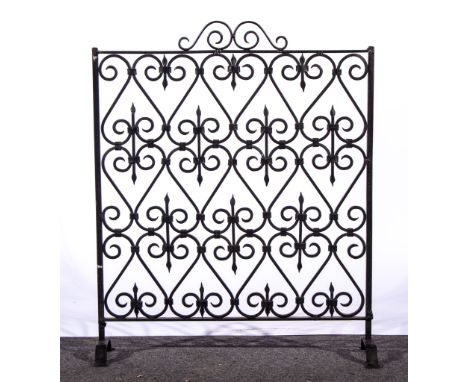 Wrought iron firescreen.
