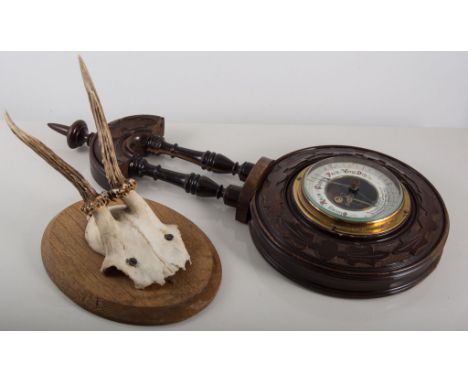 Small walnut cased aneroid barometer, carved decoration, width 43cm, mounted horns, shooting stick, leather case, bull horn n