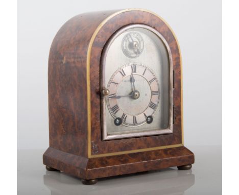 Small yew wood mantel clock, silvered face signed Camerer Cuss & Co, New Oxford Street, with slow/fast dial, movement strikin
