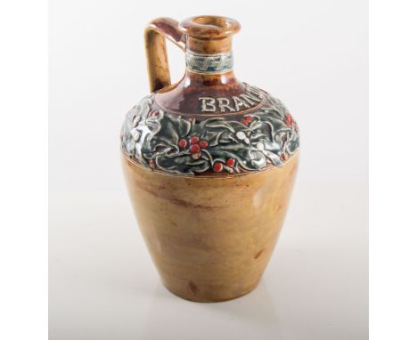 Doulton Lambeth stoneware brandy decanter, produced for Scott & Sons, height 21cms.