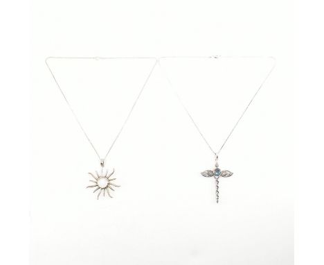 A collection of 925 silver and moonstone jewellery. The jewellery to include two moonstone pendant necklaces and a pair of mo