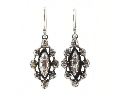 Pair of 19th Century silver girandole diamond pendant earrings. The earrings having bezel pie crust set rose cut diamonds in 