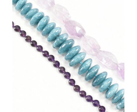 A group of three silver &amp; stone bead necklaces. The lot to include a necklace of uniform spherical amethyst beads spaced 