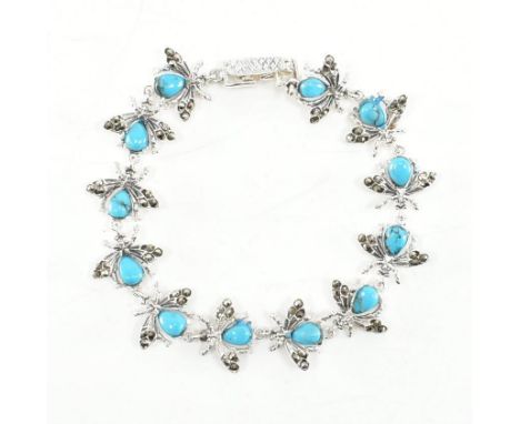 A 925 silver, enamel &amp; marcasite insect bracelet. The line bracelet depicting twelve winged insects in flight with marcas