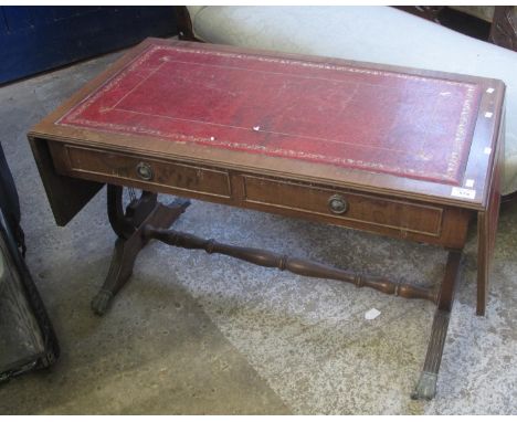 Reproduction mahogany sofa type table with leather inset top.(B.P. 21% + VAT) 