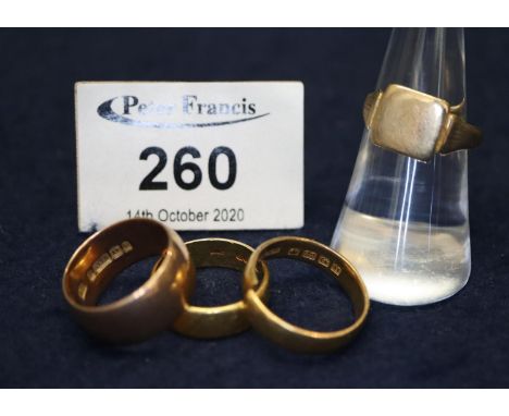 Two 22ct gold wedding rings (one cut), a 9ct gold wedding ring and a 9ct gold signet ring.  Weight in total 19.3 grams approx