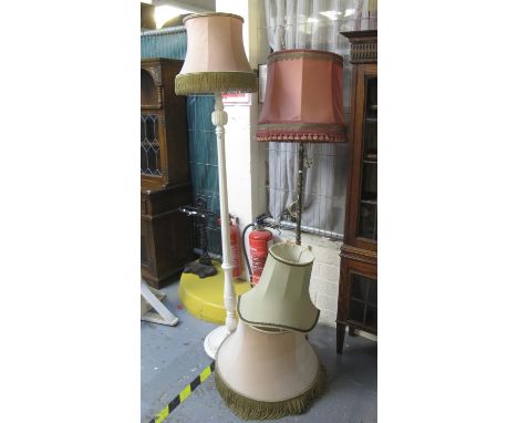 Brass standard lamp with shade, together with a white painted standard lamp on circular base with shade. (2)(B.P. 21% + VAT) 