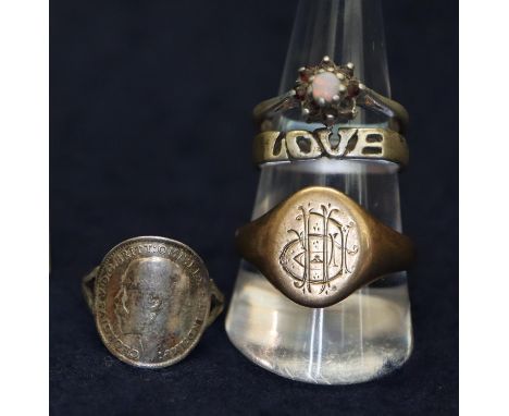 9ct gold signet ring weight 5.1 grams approx. Together with three white metal rings.(B.P. 21% + VAT) 