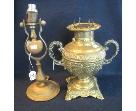Heavy brass gimballed wall light fitting, converted to electricity. Together with a brass repousse oil lamp, overall with fol