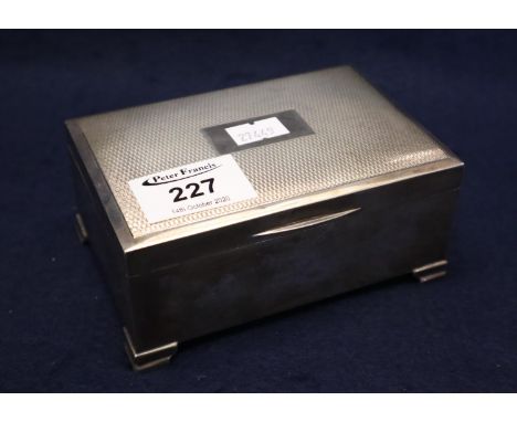 Engine turned silver cigarette box with hinged cover, 12.5cm across approx, Birmingham hallmarks. 13.4 troy ozs including lin