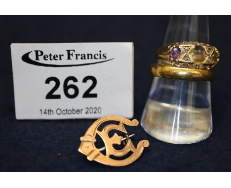 22ct gold wedding ring, 18ct gold amethyst set ring (stones missing) and a 9ct gold brooch.  Weight in total 12.g grams appro