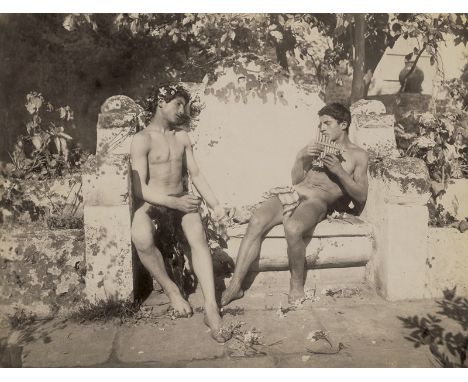   Gloeden, Wilhelm von: Two male nudes on bench  Two male nudes on bench. 1900. Vintage large-format albumen print. 28 x 37,5