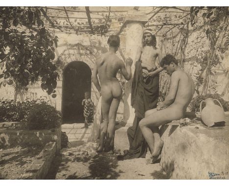   Gloeden, Wilhelm von: Young male nudes on terrace with trellis  Young male nudes on terrace with trellis. 1900. Vintage lar