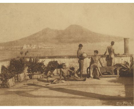   Gloeden, Wilhelm von: Nude youths on terrace with Naples harbor view in background  Nude youths on terrace with Naples harb