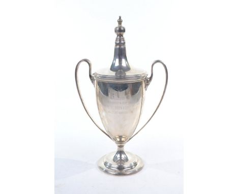 A Tiffany & Co. covered two-handled presentation cup, stamped Tiffany & Co. makers, Sterling Silver, 85680
Of urn form, with 