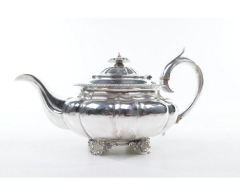 A George IV silver teapot, possibly by John Harris, London 1827
Of squat melon form, with an applied gadrooned rim to a domed