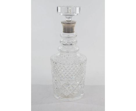 A silver and cut glass collared decanter, by F &amp; Sons Ltd., London 1982
The cut-glass of cylindrical form, with a knopped